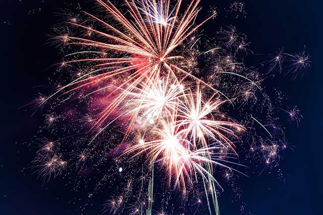 Photo of big fireworks exploding in the sky